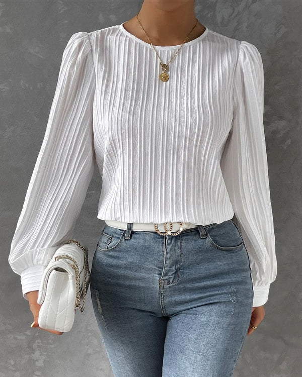 Olivia – Blus i raffinerad stil